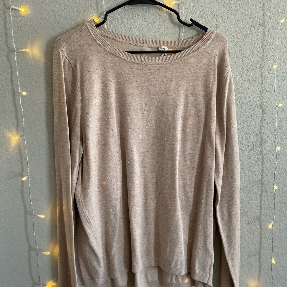 Tans sweater